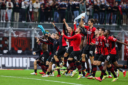 AC Milan players celebrate their victory after the Serie A 2021/22 football match between AC Milan and Venezia FC at Giuseppe Meazza Stadium in Milan.
(Final score; AC Milan 2:0 Venezia FC)