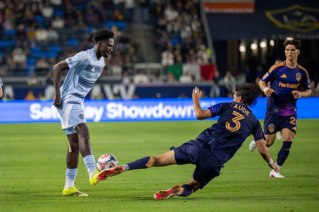 Julián Aude of the Los Angeles Galaxy and Calvin Harris of the Sporting Kansas City seen in action during MLS match between LA Galaxy and Sporting Kansas City at Dignity Health Sports Park. Final Score; LA Galaxy 1:2 Sporting KC