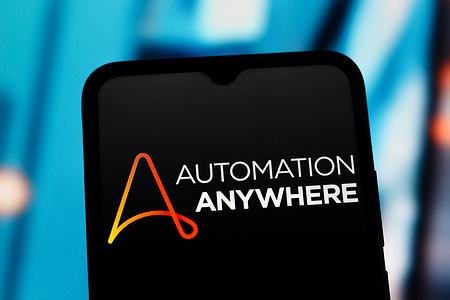 In this photo illustration, the Automation Anywhere logo is seen displayed on a smartphone screen.