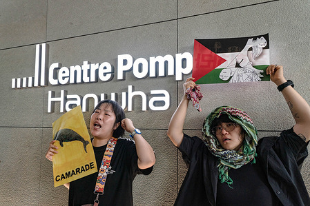 Protesters chant slogans in front of Centre Pompidou Hanwha during the demonstration. On the opening day of the Centre Pompidou Hanwha in Seoul, civic groups and artists staged a major protest to condemn the Hanwha Group for funding the new museum with revenue generated from its military defense division. Demonstrators denounced the project as an "art-washing" operation, demanding that the South Korean conglomerate sever its weapon-manufacturing partnerships with Israeli defense contractors over their involvement in the conflict in Palestine.