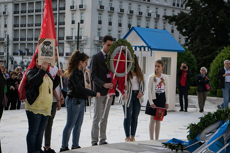 people seen holding a chaplet and flags during the celebration.
Participants celebrated the 74th anniversary for the victory over the Nazis by USSR in World War II by taking part in an Immortal Battalion march. Participants paraded with pictures of their relatives who lost their life in the war to honour them.