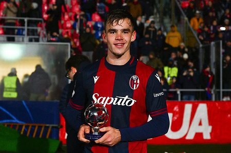 Thijs Dallinga of Bologna F.C seen holding a trophy during the 7th day of the UEFA Champions League between Bologna F.C and Borussia Dortmund at the Renato Dall'Ara Stadium. Final score; Bologna F.C 2 : 1 Borussia Dortmund.
