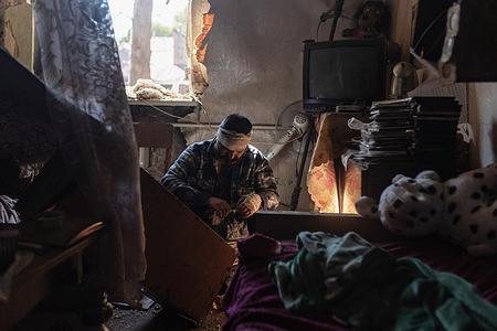 An injured resident seen in his home following a Russian air strike on a residential area. Russian forces launched a localized air strike and artillery bombardment on Kramatorsk, injuring four civilians in the eastern frontline city. The attack inflicted heavy damage on local residential and commercial infrastructure, tearing through a neighborhood shop, a private home, and four separate apartment buildings.