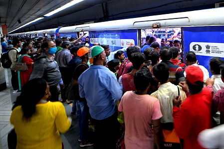 Crowds of people at Kolkata Metro Esplanade station. The Kolkata Metro is a rapid transit system serving the city of Kolkata.