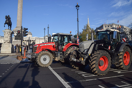 Tractors pass through Trafalgar Square as farmers stage a protest against inheritance tax on Budget Day.