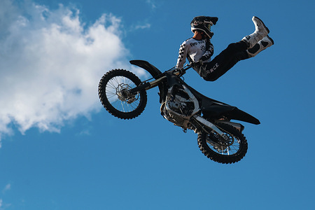 Motorcycle racers seen doing performance during the Moscow Sports day
at Luzhniki Stadium. Moscow Sports Day is a traditional festival of sports and activities. In 2025 Motorcycle racers from FMX13 Team (ProFMX Russia Team) performed at the Luzhniki Open Stadium.