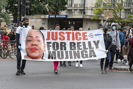 Protesters hold a banner demanding Justice for Belly Mujinga during the Black Lives Matters protest at Hyde Park in London
Black Lives Matter protests continue in the United Kingdom after the death of George Floyd killed by a police officer in Minneapolis.