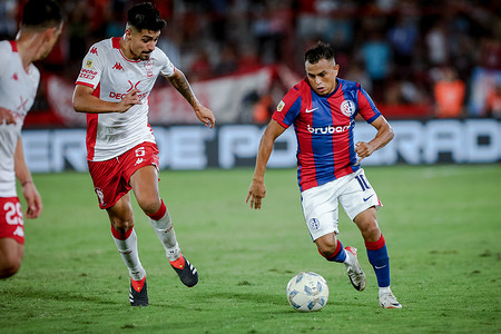 Williams Alarcon of Huracan (L) and Nahuel Barrios of San Lorenzo (R) seen in action during the match between Huracan and San Lorenzo as part of Fecha 7 - Copa de la Liga Argentina de Futbol 2024 at Tomas Duco Stadium. Final score: Huracan 0 - 0 San Lorenzo.