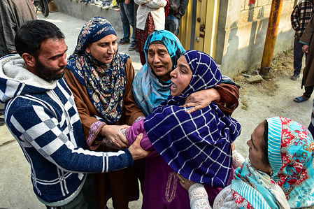 Relatives of Muhammad Shafi, a civilian killed during an explosion inside a police station mourn. Nine persons were killed and 32 others were injured in a major explosion inside a Police Station. Explosives reportedly detonated during a forensic investigation as part of a probe into an earlier blast in India’s capital, New Delhi, that killed 13 people and injured dozens.