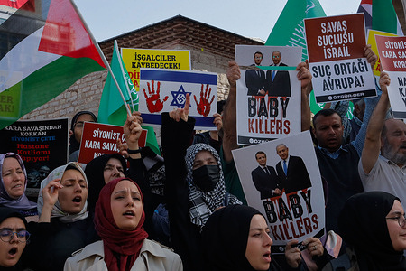 Protesters hold placards expressing their opinion during the demonstration. Turkish individuals congregated outside Taksim Mosque in Istanbul after Friday prayers, demonstrating their solidarity with the people of Gaza in Palestine. They offered prayers and voiced their unwavering support for the Palestinian community in the face of ongoing events.