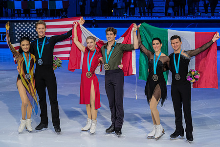 L) Madison Chock and Evan Bates of USA (Silver), (C) Piper Gilles and Paul Poirier of Canada (Gold) and (R) Charlene Guignard and Marco Fabbri of Italy (Bronze) pose with their medals in the Senior Pairs Ice Dance during the ISU Grand Prix of Figure Skating Final Turin at Palavela.