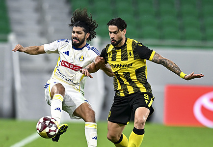 Joao Pedro (R) of Qatar SC and Ferjani Sassi (L) of Al-Gharafa SC seen in action during the Qatar Stars League match between Qatar SC and Al-Gharafa SC at Al Thumama Stadium. Final score; Qatar SC 2 : 0 Al-Gharafa SC.