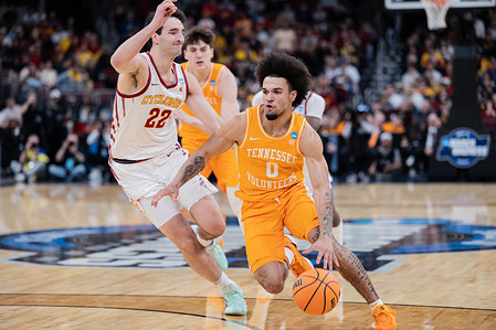 Ja'Kobi Gillespie (R) of the Tennessee Volunteers in action against Milan Momcilovic (L) of the Iowa State Cyclones in the Sweet 16 round of the NCAA Men’s Basketball Tournament at the United Center in Chicago, Illinois. Final score: Tennessee 76, Iowa State 62.
