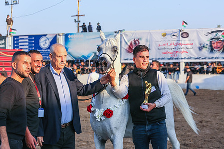 The management team of the event honors the winner of the competition. Palestinian local club called Al-Jawad organised a competition for the most beautiful horses in the purebred Arabian category in the Gaza strip.