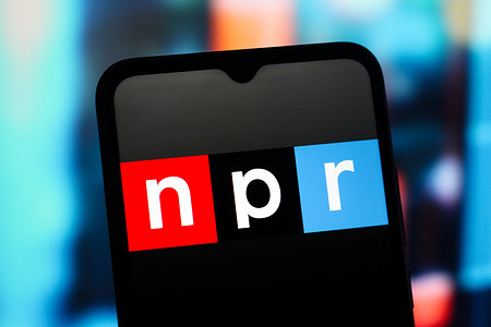 In this photo illustration, the NPR (National Public Radio) logo is seen displayed on a smartphone screen.