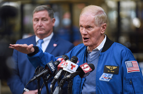 NASA Administrator Bill Nelson (R) delivers his speech while Orlando Aviation Authority CEO Phil Brown (L) attentively listens during a press conference of the implementation of a NASA-developed flight scheduling technology to all airports across the country in 2023.
The Airspace Technology Demonstration 2 (ATD-2) system was transferred to the Federal Aviation Administration (FAA) in September. This technology will allow planes to roll directly to the runway for takeoff to avoid excessive taxi-out time and hold time thereby reducing fuel use, emissions, and passenger delays.