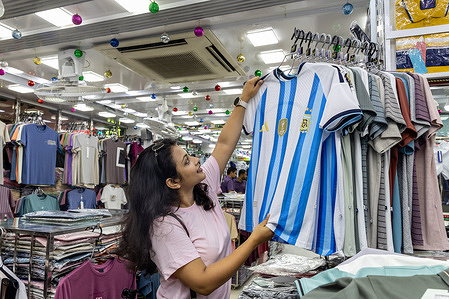 A Bangladeshi football fan seen buying an Argentina jersey during the 2026 FIFA World Cup.