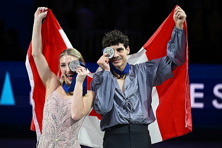 Silver medalists Piper Gilles (L) and Paul Poirier of Canada as seen during the medal ceremony for Ice Dance competition at the ISU Figure Skating World Championships 2026 at the O2 Arena. ISU Figure Skating World Championships 2026 takes place from 24th to 29th of March in Prague, Czech Republic.
