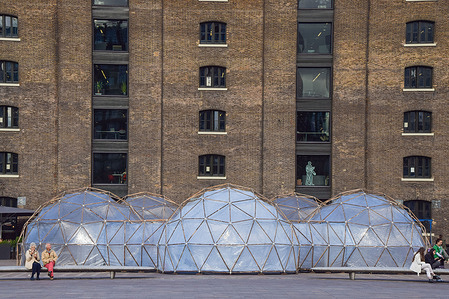 Pollution Pods by Michael Pinsky seen outside Central Saint Martins at Granary Square, King's Cross.
The installation features five geodesic domes, each containing a different environment and air quality, and will allow visitors to experience the clean air of Tautra in Norway, and pollution of New Delhi, Beijing, Sao Paulo and London.
