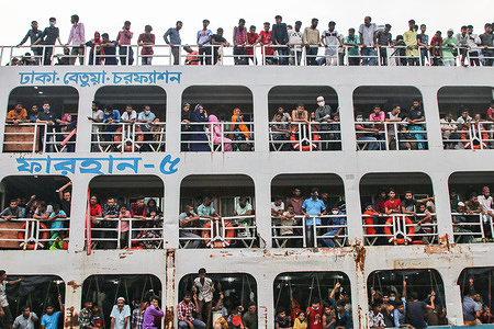 Crowds of people are seen on ferry as they travel back home ahead of the Muslim festival Eid al-Adha or the 'Festival of Sacrifice' in Dhaka.Muslims across the world celebrate the annual festival of Eid al-Adha, or the Festival of Sacrifice, which marks the end of the Hajj pilgrimage to Mecca and in commemoration of Prophet Abraham's readiness to sacrifice his son to show obedience to God.