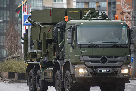 Lithuanian army air defence systems NASAMS take part in a military parade during Armed Forces Day in Vilnius. Armed Forces Day honours the restoration of the Lithuania armed forces on November 23, 1918. The military parade commemorating the holiday is being held this year on November 25 in Vilnius. Both Lithuanian military and allies from NATO countries took part in the parade, totaling about 1,400 people and 100 pieces of military equipment.