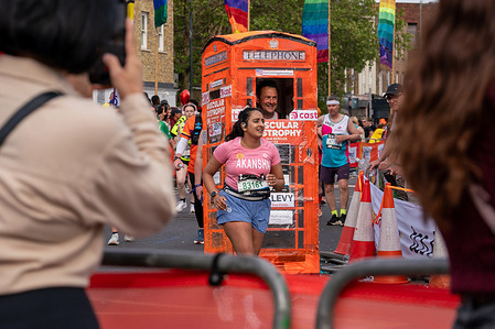 runners of the London Marathon 2026 seen running mile 21 on Rainbow Row The London Marathon 2026.
Mile 21 is named Rainbow Row for the day and sees a stage set up with lots of entertainment & Drag Artists.
