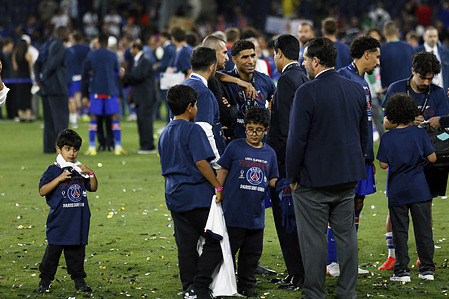 Achraf Hakimi and Marcos Aoás aka Marquinhos seen during post-match celebrations for UEFA Super Cup match between Paris Saint-Germain and Aston Villa at Red Bull Arena. Final score Paris Saint-Germain 2 : 1 Aston Villa