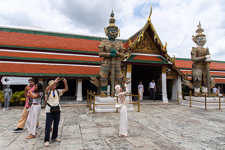 Tourists visit the Temple of the Emerald Buddha (Wat Phra Kaew). The Temple of the Emerald Buddha also known as Wat Phra Kaew is a famous destination for tourists located next to the Chao Phraya River in the Thai capital Bangkok. This historical landmark was built in 1782 and is one of the country's most significant religious sites.