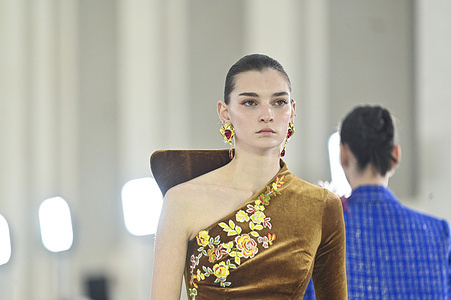 A model walks the runway wearing a design by Claro Couture during Mercedes-Benz Fashion Week de Madrid in IFEMA, 18 March 2026 Spain