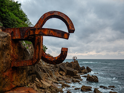 General view of the famous art piece called “Comb of the Wind” by Eduardo Chillida. The Northern Way (Camino del Norte) is a branch of the Camino de Santiago stretching 825 to 865 km across northern Spain, depending on the starting point and route variations. Along the way, hikers encounter art, sculptures, churches, and museums. The Camino de Santiago, or Way of St. James, is a historic pilgrimage network leading to the Cathedral of Santiago de Compostela in Galicia, northwestern Spain.