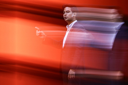 Parit Wacharasindhu, speaks during an election campaign. The People’s Party campaigns in Bangkok ahead of the February general election by presenting its policies, after winning the previous election but failing to form a government.