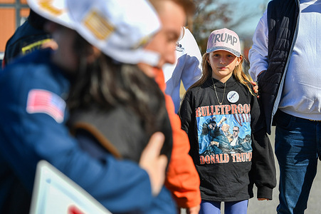 A young Trump supporter wears a Trump hat and shirt. Luzerne County a normally democrat county flipped in the election in 2016. The Pennsylvania county is a hot spot for this election. Trump supporters led a parade through the county supporting the former president.