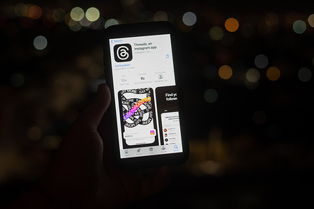 In this photo illustration, a user sees in his download application that Threads will soon be launched, the direct competition for Twitter and which belongs to Meta, which will be launched on Thursday in the United States and on Friday for the rest of the world.