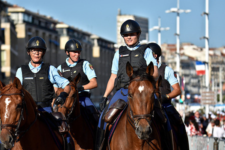 Representatives of the Republican Guard parade in the Old Port of Marseille during the Bastille Day parade Military parade on the Old Port of Marseille on the occasion of the Bastille Day military ceremony.