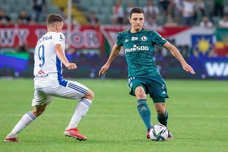 Dawid Kocyla of Wisla Plock and Bartosz Slisz of Legia in action during the Polish PKO Ekstraklasa League match between Legia Warszawa and Wisla Plock at Marshal Jozef Pilsudski Legia Warsaw Municipal Stadium.
Final score; Legia Warszawa 1:0 Wisla Plock.