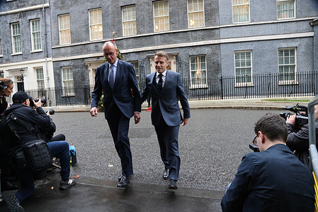 German Chancellor Friedrich Merz and French President Emmanuel Macron leave No 10 Downing Street after take stock of the situation and review progress in the ongoing US-led and US-mediated negotiations aimed at advancing a potential framework for ending the war in Ukraine.