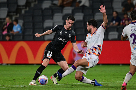 Bozhidar Boykov Kraev (L) of the Wellington Phoenix FC team and Luke Joshua Bodnar (R) of the Perth Glory FC seen in action during the Isuzu UTE A-League season Unite Round match between Perth Glory and Wellington Phoenix at CommBank Stadium. Final score; Wellington Phoenix 4:3 Perth Glory.