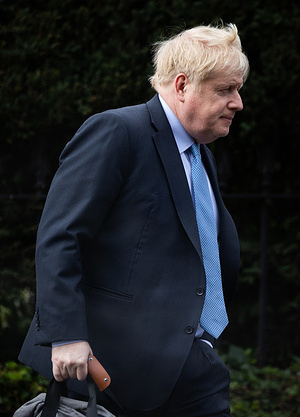 Former Prime Minister Boris Johnson leaves his home in London. Johnson will seek to save his reputation by giving evidence to a committee investigating whether he deliberately lied to lawmakers over Partygate, a series of lockdown-busting gatherings held in Downing Street during the pandemic.