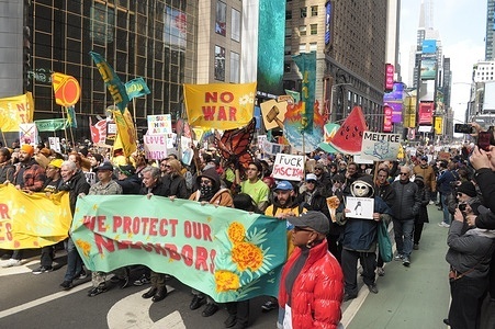 (EDITOR'S NOTE: Image depicts profanity) Demonstrators march holding banners and placards at a Trump protest in Times Square. Demonstrators in Manhattan, New York City protested against Donald Trump in a “No Kings” rally. Protesters claimed Trump is acting as if he has ultimate power and challenging the government’s checks and balances system. Demonstrators condemned the U.S. and Israel’s war against Iran. Activists also denounced Trump’s immigration policies and the U.S. Immigration and Customs Enforcement or ICE for arresting and deporting immigrants.