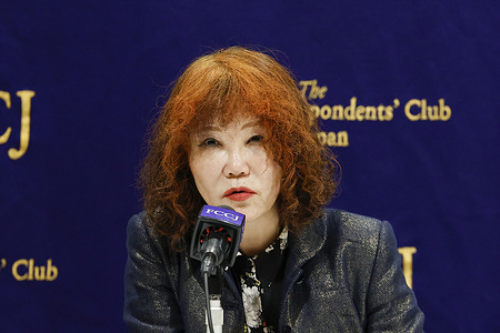 Kazue Akita, an attorney at law of Tokie Tanaka speaks during a press conference at The Foreign Correspondents' Club. A Japanese nurse, Tanaka visited the Club to accuse the Catholic Church of mishandling rape allegations against a priest and failing to take adequate disciplinary action.