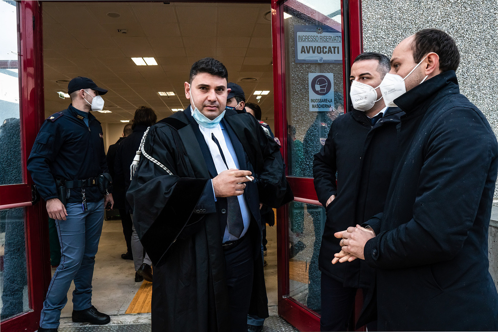 Lawyers seen relax outside the bunker room.
“Rinascita Scott”, one of the biggest trial for mafia in Italy, kicked off on January 13th in the bunker room in Lamezia Terme, led by anti-mafia prosecutor Nicola Gratteri. More than 350 alleged members of mafia and nearly 400 lawyers will attend a trial that targets the organized crime (‘ndrangheta).