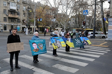 Activists with placards expressing their opinion and portraits of fallen Ukrainian Armed Forces soldiers during a protest at Taras Shevchenko Avenue. A minute of silence is another ritual of respect for fallen soldiers, common in many cultures and religions. On March 16, 2022, Volodymyr Zelenskyy signed a decree establishing a nationwide minute of silence. Since then, Ukraine has commemorated the fallen every day at 9:00 a.m.