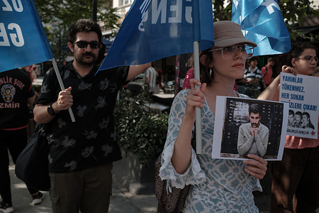 A student holds a photo of Deniz Gezmis. University and high school socialist students gathered to mark the 53rd anniversary of the May 6, 1972, execution of Deniz Gezmiş, Yusuf Aslan, and Hüseyin İnan, founders of the People's Liberation Army of Turkey (THKO).