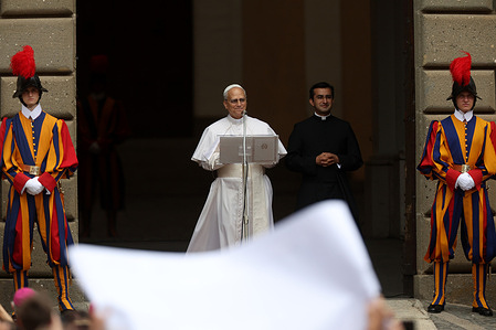 Pope Leo XIV recites the Sunday Angelus at the door of the Apostolic Palace in front of thousands of faithful and pilgrims in Piazza della Liberta.