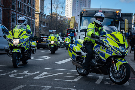 The Metropolitan Police lead the March for Sudan — End the War, Defend the Revolution, Expose the Imperialist Order. A march was held in London to celebrate the seventh anniversary of the Sudanese Revolution, which began as a popular uprising against military rule and exploitation. The demonstration was held to commemorate the power of Sudanese grassroots organization (resistance committees, trade unions, etc.). To protest the current devastating war waged by the two main militias (SAF and RSF), which is a counter-revolution. To stand in solidarity with the Sudanese people suffering from war, and expose imperialist powers fueling the conflict.