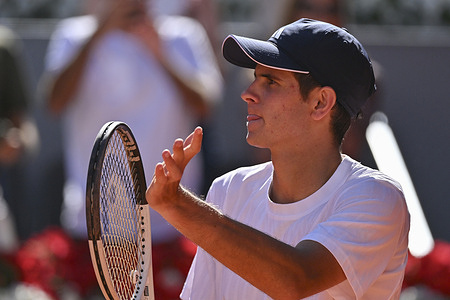 Rafael Jodar of Spain plays against Vit Kopriva of Czech Republic (not in view) during the Men's Singles Round of 16 match on day nine of the Mutua Madrid Open at La Caja Magica. Victory of Rafael Jodar 7-5, 6-0