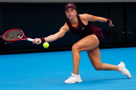 Iva Jovic of the United States plays against Iga Swiatek of Poland (Not Seen) during Women's Singles Round of 16 match on day eight of China Open at the National Tennis Center.