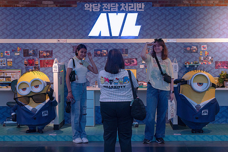 People seen posing for a photo in front of the movie 'Despicable Me 4' in Seoul which will be released on July 24th in South Korea. 'Despicable Me 4' is released in South Korea.