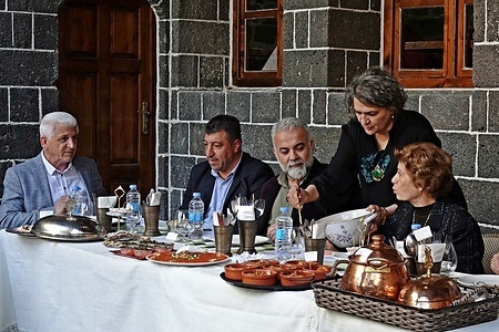 The dishes prepared for the competition are seen being presented to the jury members. Filiz Parlak, a Gastronomy Gastronomy in Diyarbakir, He organized a Natural Herb Food Competition. In order to promote the herbs grown in the Hevsel gardens of the World Cultural Heritage and the foods made with these herbs, 41 types of food were prepared from 21 types of herbs. Among the foods and drinks were sweet foods made from these herbs, pickles, jams, cookies, Turkish delight, coffee, tea, Decanters, bread. In the competition held in the historical Zerzevan Palace, the jury members tasted 21 types of food and gave points and awards were given to the ladies who won the first three degrees. At the end of the competition, the foods were eaten by the guests watching the competition.