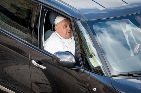 Pope Francis leaves on a car after presiding over the Mass for the Jubilee of the Armed Forces in St. Peter's Square.